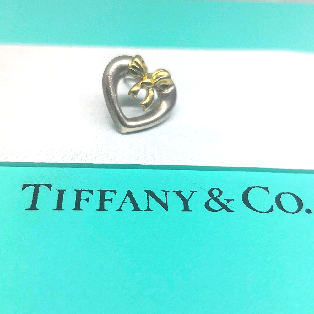Single earring silver - gold.